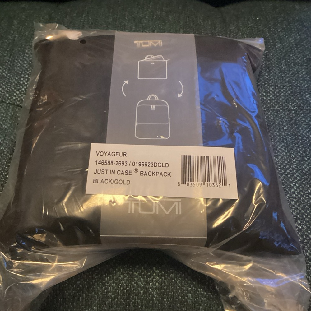 Tumi Just in Case Black and Gold Backpack
